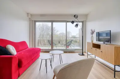 Télévision ou salle de divertissement dans l'établissement Appartement Luxueux Cosy - Paris Expo