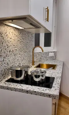 Cuisine ou kitchenette dans l'établissement Chic appartement en plein cœur de Paris