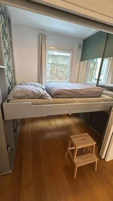 Un ou plusieurs lits dans un hébergement de l'établissement Trocadéro Prestige Residence Paris 16