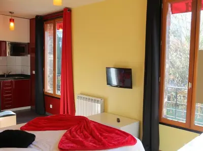 Un ou plusieurs lits dans un hébergement de l'établissement Marinha Hôtel