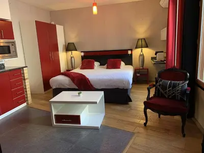 Un ou plusieurs lits dans un hébergement de l'établissement Marinha Hôtel