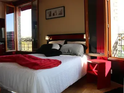Un ou plusieurs lits dans un hébergement de l'établissement Marinha Hôtel