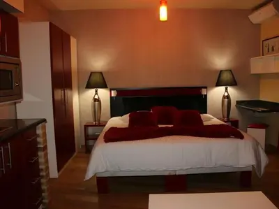 Un ou plusieurs lits dans un hébergement de l'établissement Marinha Hôtel