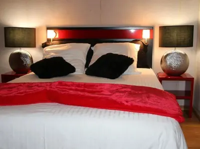 Un ou plusieurs lits dans un hébergement de l'établissement Marinha Hôtel