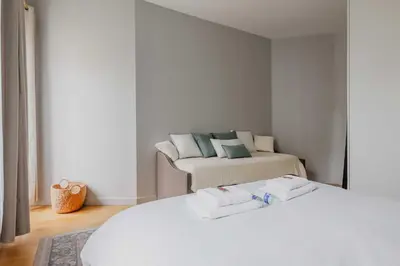 Un ou plusieurs lits dans un hébergement de l'établissement Luxurious apartment - 4BR-10P- Ternes-Pereire