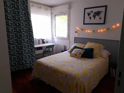 Un ou plusieurs lits dans un hébergement de l'établissement Appartement spacieux, à 20 min de gare St Lazare