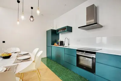 Cuisine ou kitchenette dans l'établissement Sereners - Place des Vosges