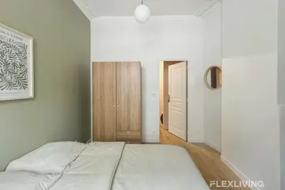 Un ou plusieurs lits dans un hébergement de l'établissement Flexliving - 99 Felix Faure - Room