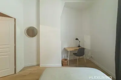 Un ou plusieurs lits dans un hébergement de l'établissement Flexliving - 99 Felix Faure - Room