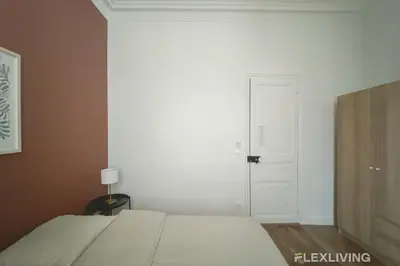 Un ou plusieurs lits dans un hébergement de l'établissement Flexliving - 99 Felix Faure - Room