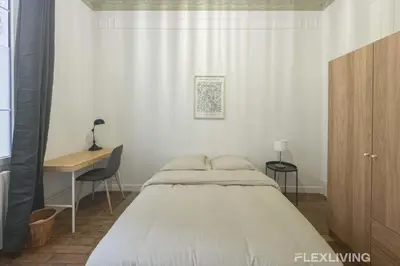 Un ou plusieurs lits dans un hébergement de l'établissement Flexliving - 99 Felix Faure - Room