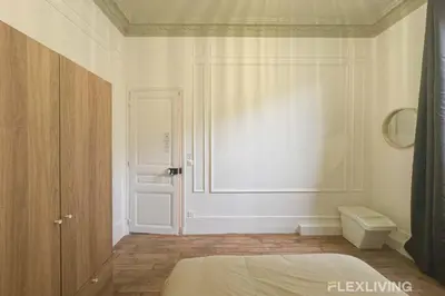 Un ou plusieurs lits dans un hébergement de l'établissement Flexliving - 99 Felix Faure - Room