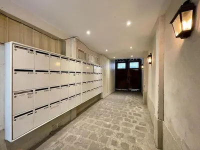 Un ou plusieurs lits dans un hébergement de l'établissement Archives Gallery -Unique and élégant Studio Paris center