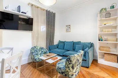 Coin salon dans l'établissement Top Appartement Avenue Ternes Paris