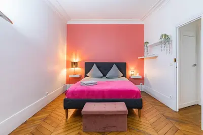 Un ou plusieurs lits dans un hébergement de l'établissement Top Appartement Avenue Ternes Paris