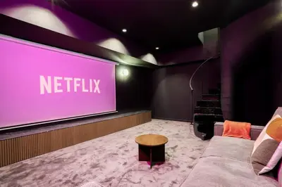 Télévision ou salle de divertissement dans l'établissement Sublime duplex avec salle de cinéma