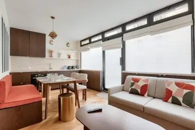 Coin salon dans l'établissement Sublime duplex avec salle de cinéma