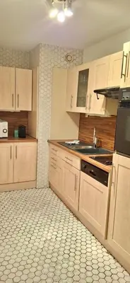 Cuisine ou kitchenette dans l'établissement Home Sweet Home Champs Elysées Berri
