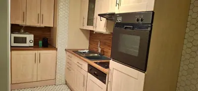 Cuisine ou kitchenette dans l'établissement Home Sweet Home Champs Elysées Berri