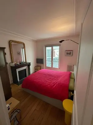 Un ou plusieurs lits dans un hébergement de l'établissement Charming and bright flat in a very convenient area