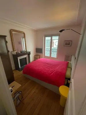 Un ou plusieurs lits dans un hébergement de l'établissement Charming and bright flat in a very convenient area