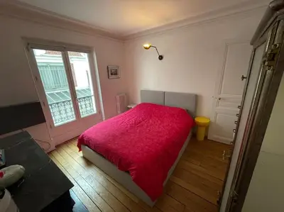 Un ou plusieurs lits dans un hébergement de l'établissement Charming and bright flat in a very convenient area