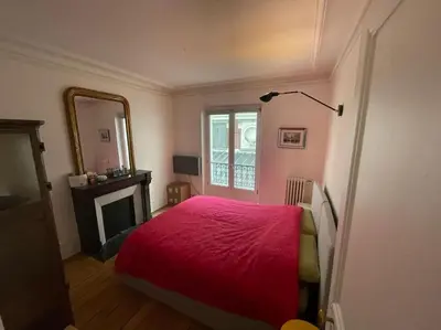 Un ou plusieurs lits dans un hébergement de l'établissement Charming and bright flat in a very convenient area