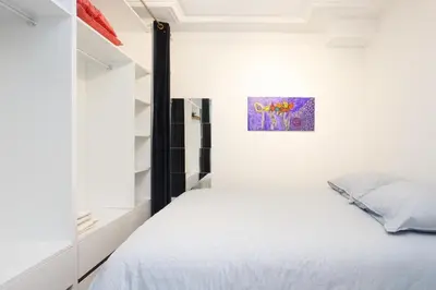 Un ou plusieurs lits dans un hébergement de l'établissement Cosy Flat 30m2 Paris Centre