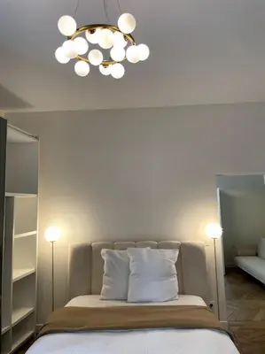 Un ou plusieurs lits dans un hébergement de l'établissement Paris Luxury Family Getaway