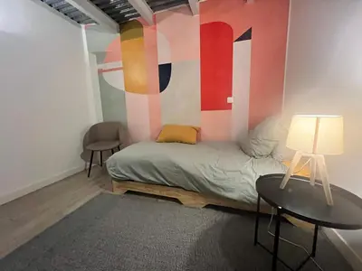 Un ou plusieurs lits dans un hébergement de l'établissement Urban retreat in Paris