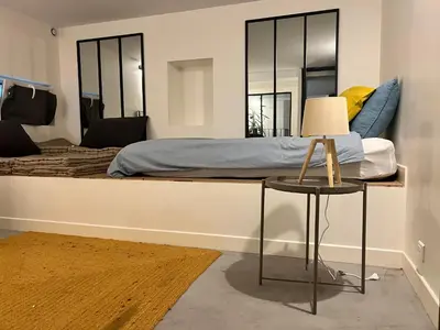 Un ou plusieurs lits dans un hébergement de l'établissement Urban retreat in Paris