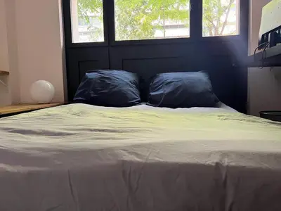 Un ou plusieurs lits dans un hébergement de l'établissement Urban retreat in Paris