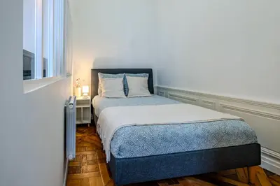 Un ou plusieurs lits dans un hébergement de l'établissement Luxueux Appartement à Notre-Dame