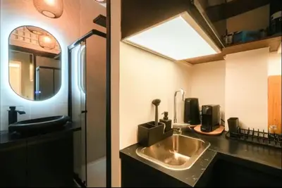 Cuisine ou kitchenette dans l'établissement Appartement parisien chic & cosy MBKA