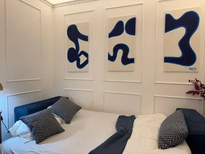 Un ou plusieurs lits dans un hébergement de l'établissement Appartement parisien chic & cosy MBKA