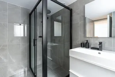 Salle de bains dans l'établissement Invalides Palais Bourbon Luxueux Appartement 4P