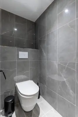 Salle de bains dans l'établissement Invalides Palais Bourbon Luxueux Appartement 4P