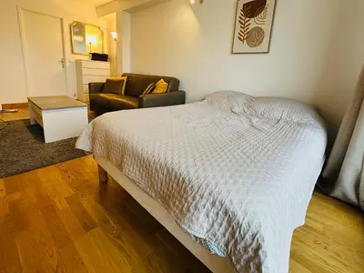 Un ou plusieurs lits dans un hébergement de l'établissement Montparnasse Duroc Paris