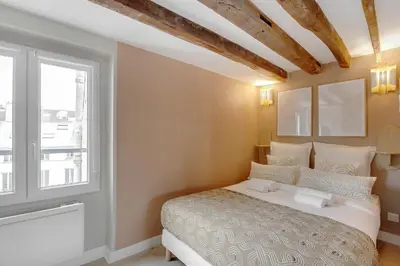 Un ou plusieurs lits dans un hébergement de l'établissement Stylish apartment in Le Marais