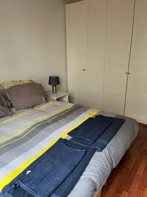 Un ou plusieurs lits dans un hébergement de l'établissement Appartement à Levallois