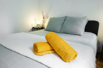 Un ou plusieurs lits dans un hébergement de l'établissement Appartement Central Les Halles