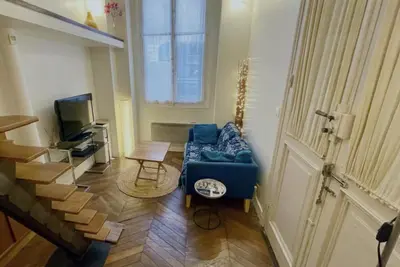 Télévision ou salle de divertissement dans l'établissement Studio NOTRE-DAME