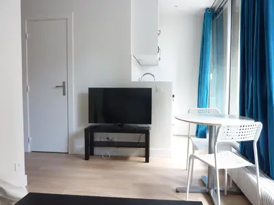 Télévision ou salle de divertissement dans l'établissement Eiffel Grenelle