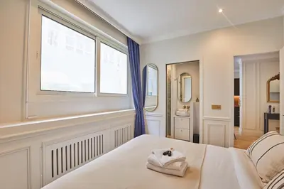 Un ou plusieurs lits dans un hébergement de l'établissement Eiffel Tower Apartment Invalides