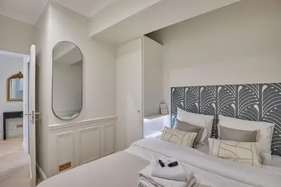 Un ou plusieurs lits dans un hébergement de l'établissement Eiffel Tower Apartment Invalides