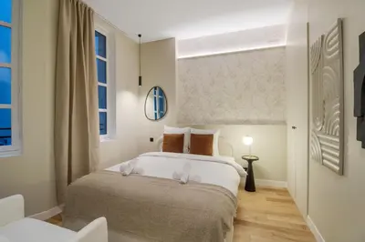 Un ou plusieurs lits dans un hébergement de l'établissement Grand appartement climatisé Bastille - Marais