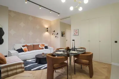 Coin salon dans l'établissement Grand appartement climatisé Bastille - Marais