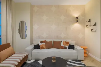 Coin salon dans l'établissement Grand appartement climatisé Bastille - Marais