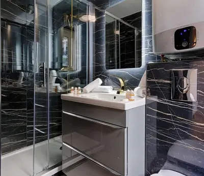 Salle de bains dans l'établissement MyKeypers - Stylish & Luxury Duplex 2BR-8P - Le Marais