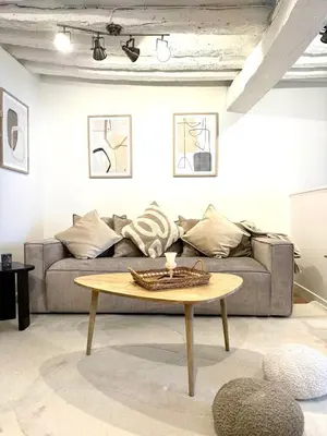 Coin salon dans l'établissement Apartment Saint Germain des Pres Bon Marche by Studio Prestige
